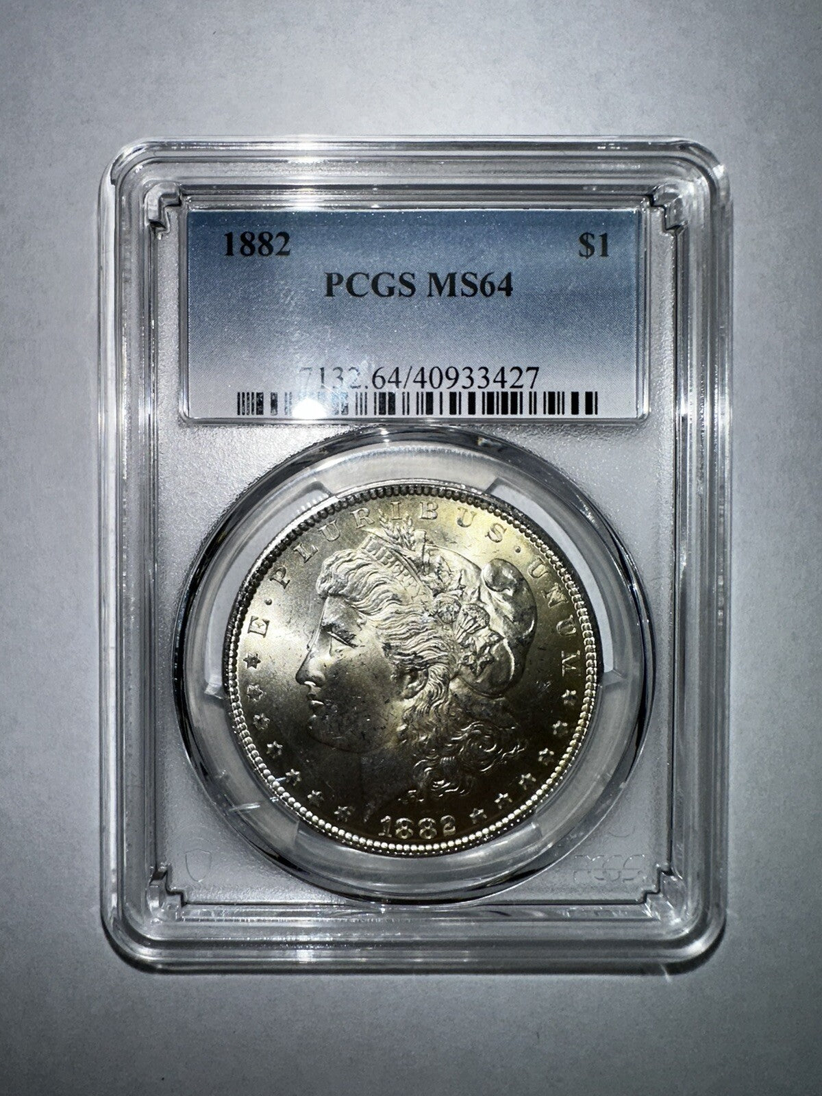 1882 $1 PCGS MS64 - Morgan Dollar