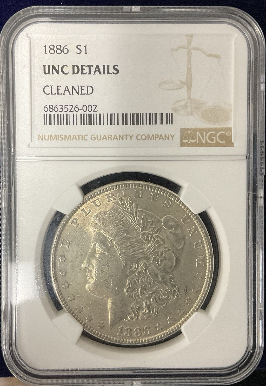1886 Morgan Silver Dollar NGC UNC Details