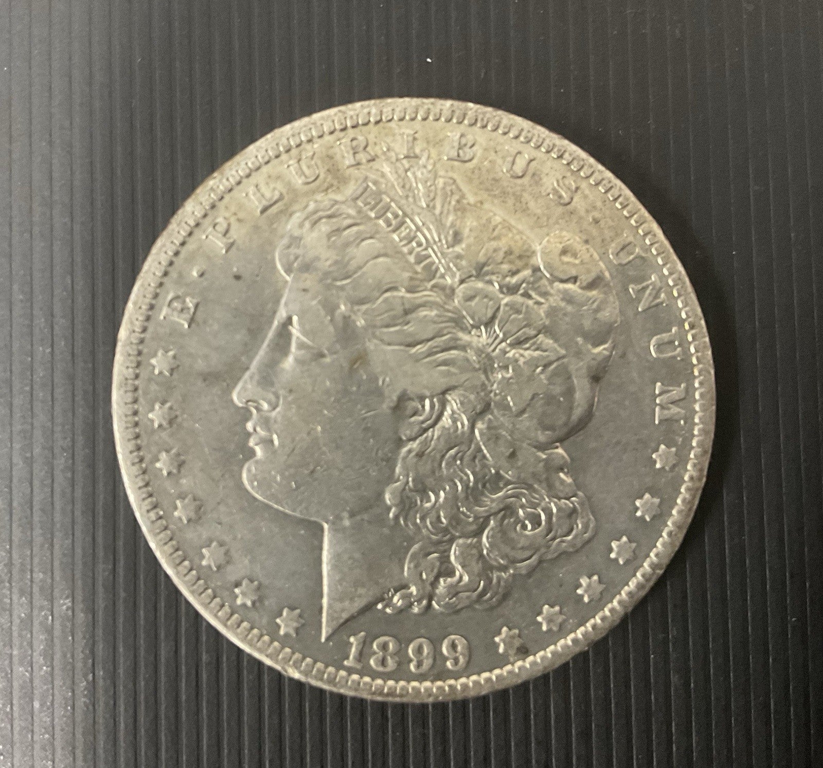 1899 O Morgan Silver Dollar